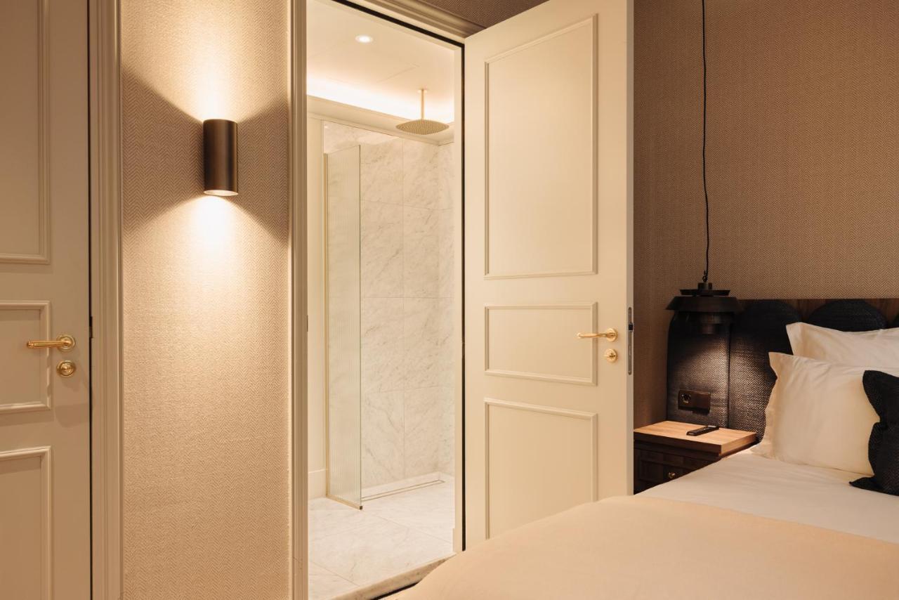 Hotel 717 อัมสเตอร์ดัม ภายนอก รูปภาพ A wall-mounted light