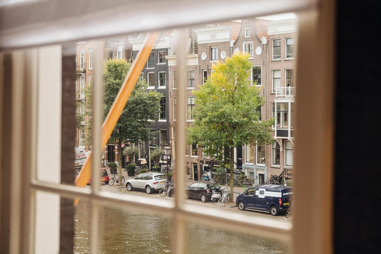 Hotel 717 อัมสเตอร์ดัม ภายนอก รูปภาพ View from the window of a canal house in Amsterdam