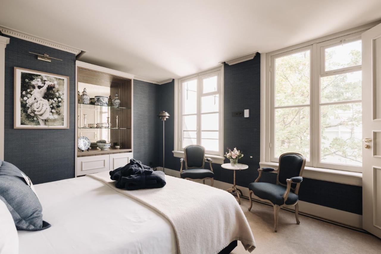 Hotel 717 อัมสเตอร์ดัม ภายนอก รูปภาพ A bedroom at The Ivy Hotel